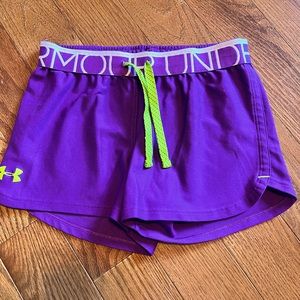 Under Armour Youth athletic shorts. Sz Md. Purple/yellow
